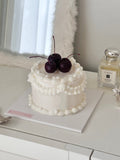 Velvet cherry dress cake candle